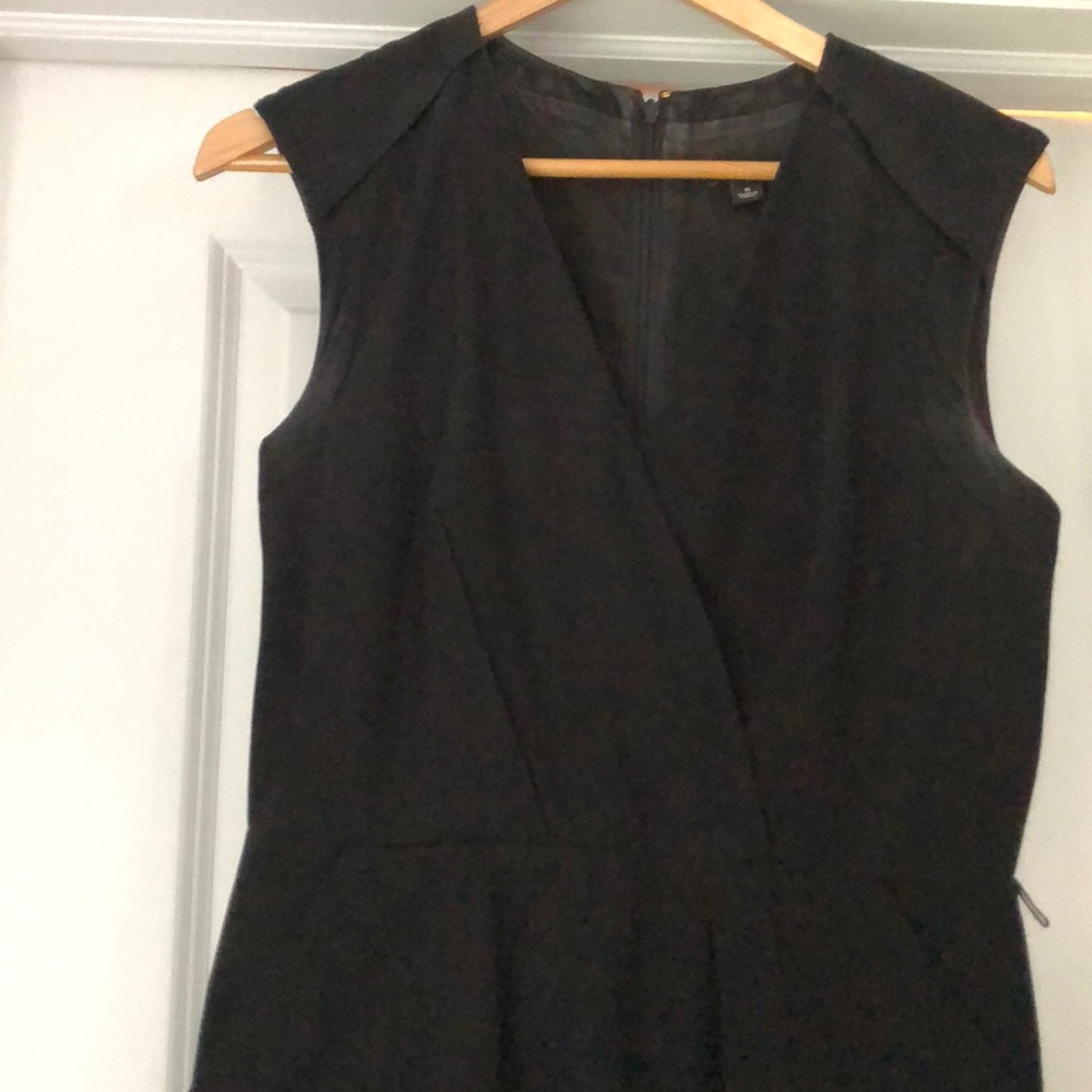 Dark navy v neck dress. Pleated design in front